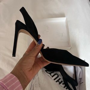 Schutz black sling back heel